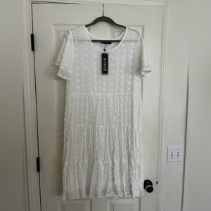 White tiered dress with polka dots